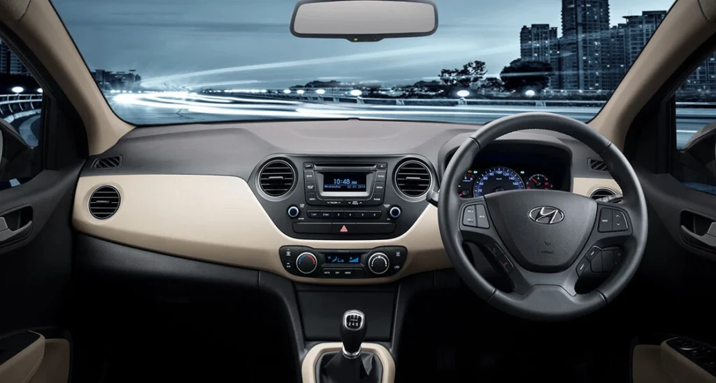 Hyundai Xcent Review: Is This Compact Sedan Still a Smart Buy in 2025? 3 xcent gallery front side interior rear passenger viewpoint original